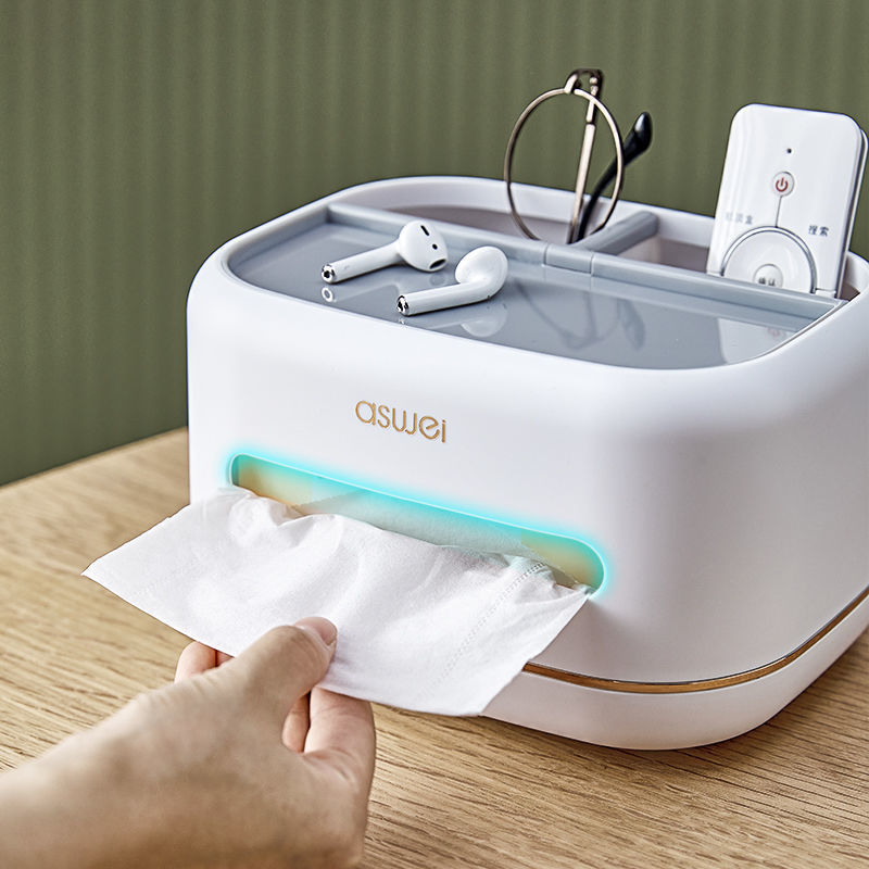 קופסת טישו מעוצבת הכוללת מתקן לשלטים ומעמד לפלאפון